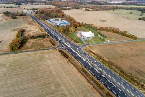2015 project opened four travel lanes across MD 404